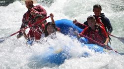 Blue-sky-rafting-estacada-clackamas-group-hits-a-big-rapid-on-a-river-in-Oregon2